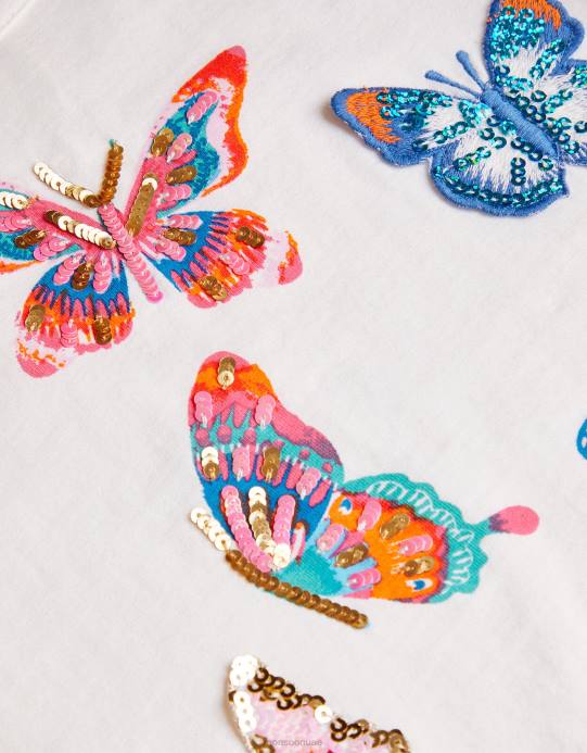 Monsoon بنت قمة الفراشة مزينة بالترتر D68H1811 ملابس عاج