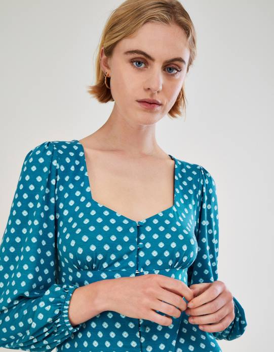 Monsoon نحيف فستان جيرسيه قصير بيبي دول بطباعة هندسية D68H430 ملابس الأزرق (الفيروز)